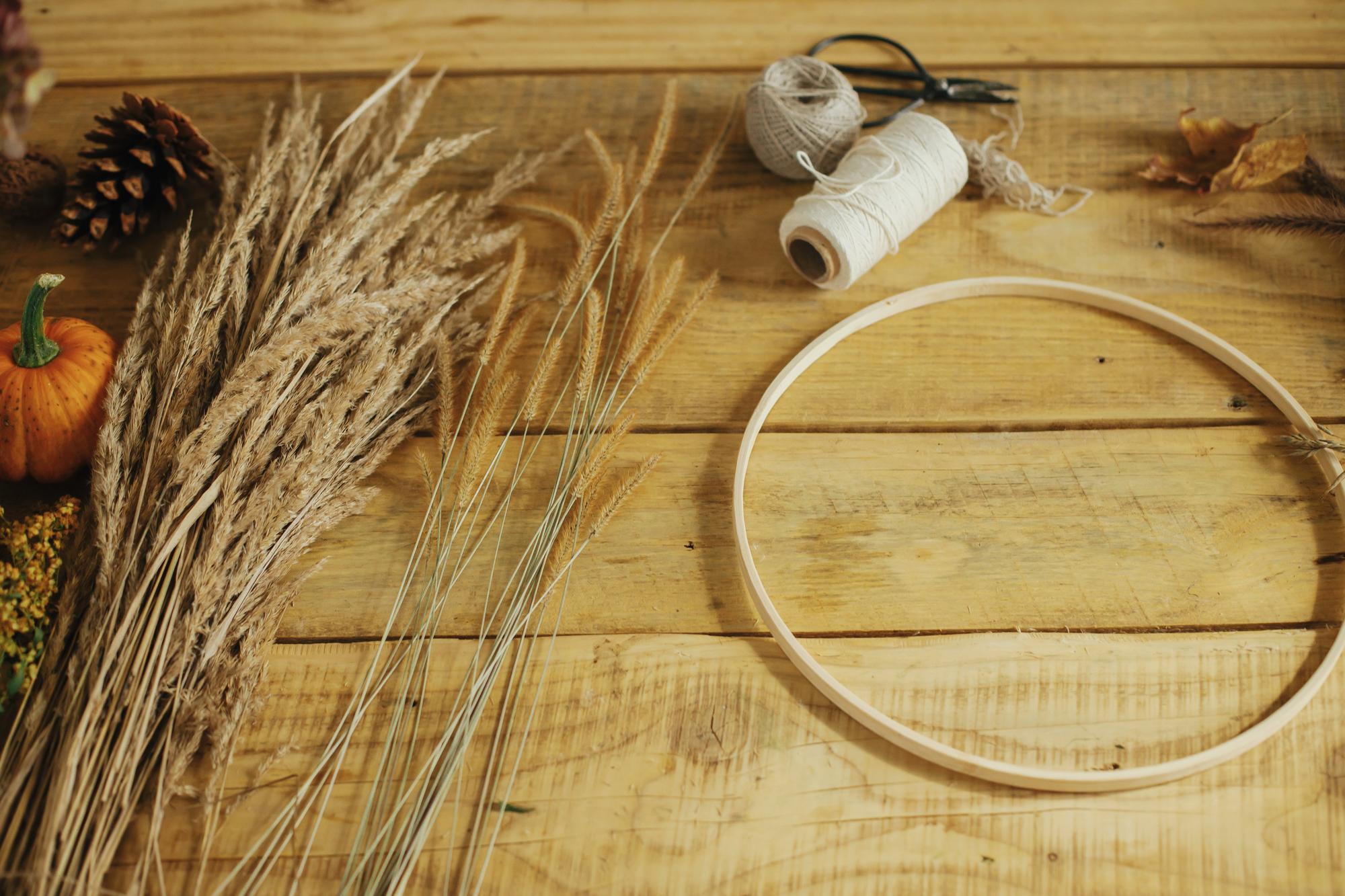 studio workspace with hoop and threads